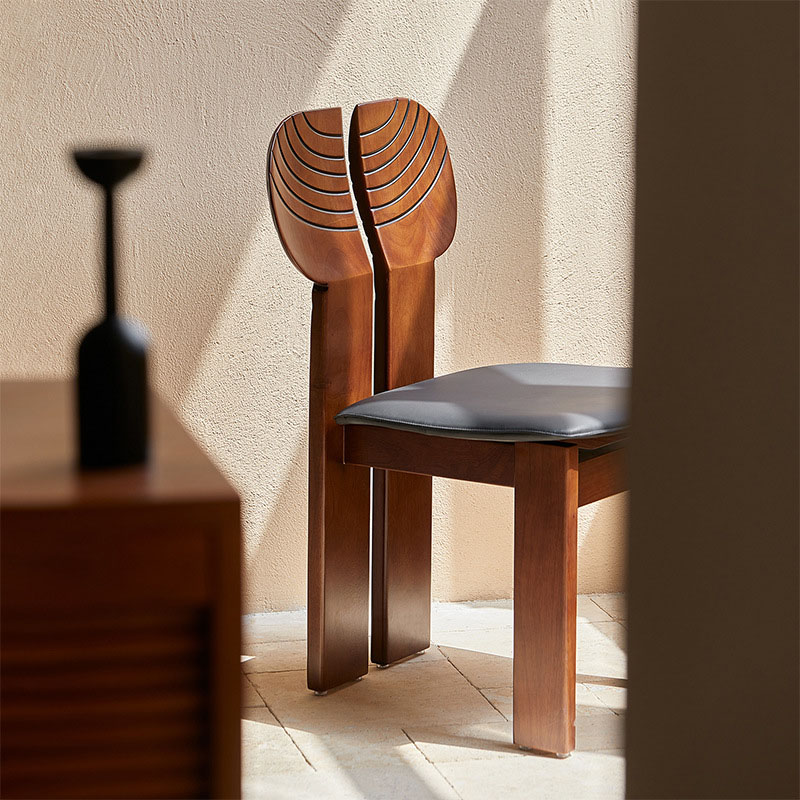 Luxury ash wood chair featuring unique backrest design for modern interiors