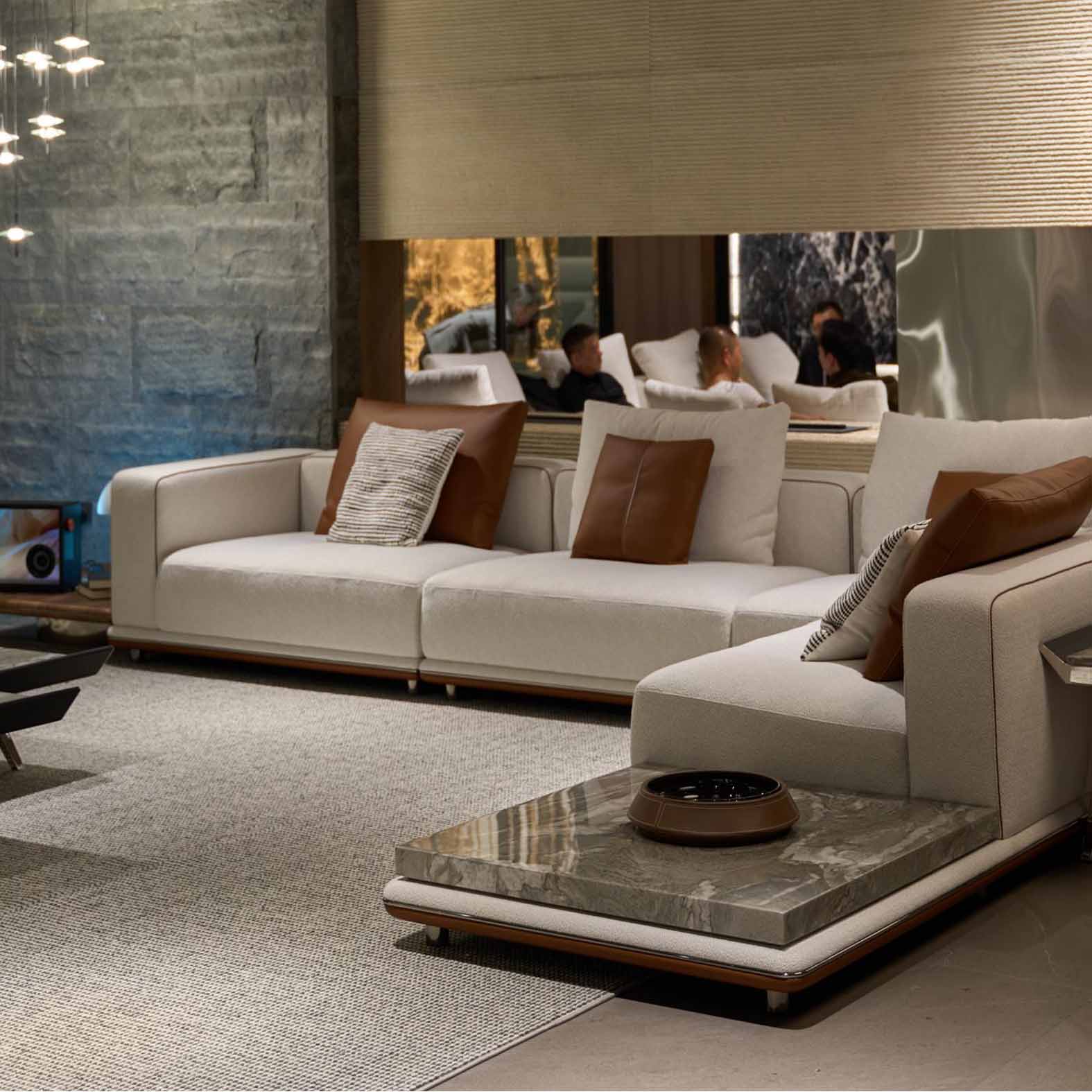 Modern Italian sectional sofa with built-in solid wood and sintered stone side tables, ideal for luxury villas and hotel lobbies.