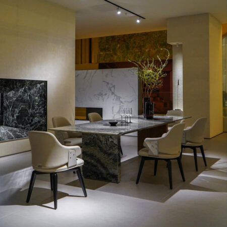 Luxury dining table and chairs set displayed in upscale restaurant interior